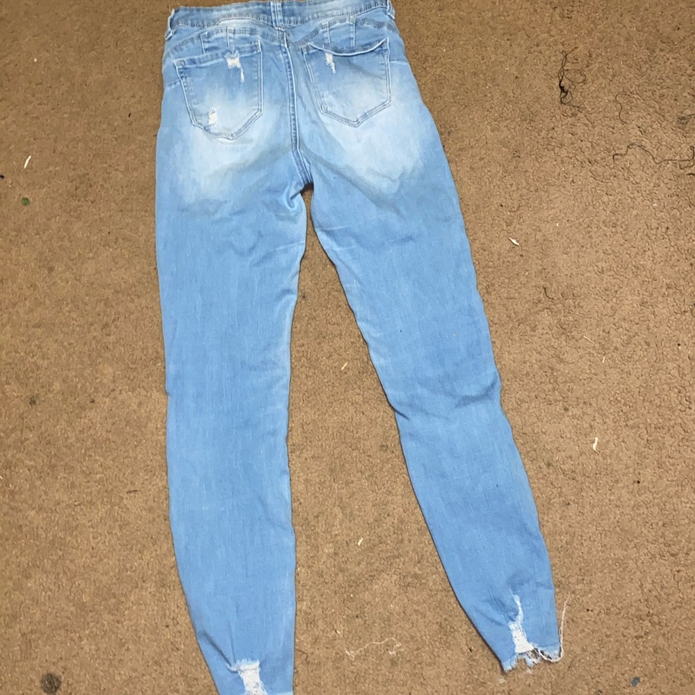 light blue ripped skinny jeans